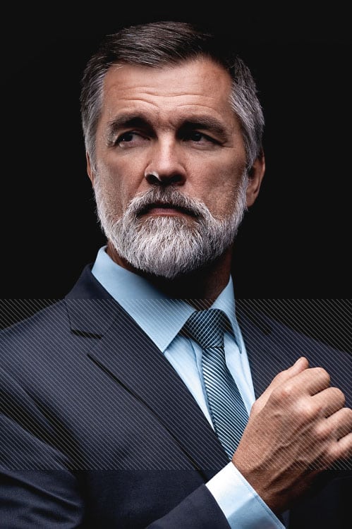 gentleman with graying hair and beard
